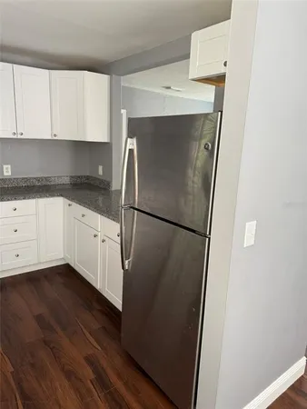 a bathroom with a toilet a sink and bathtub