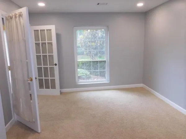an empty room with windows