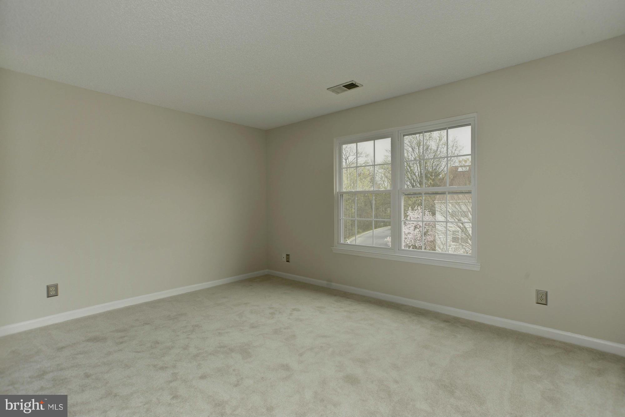12000 Golf Ridge Court, Unit 352 Fairfax, VA 22033 - Photo 14 of 29 an empty room with a window