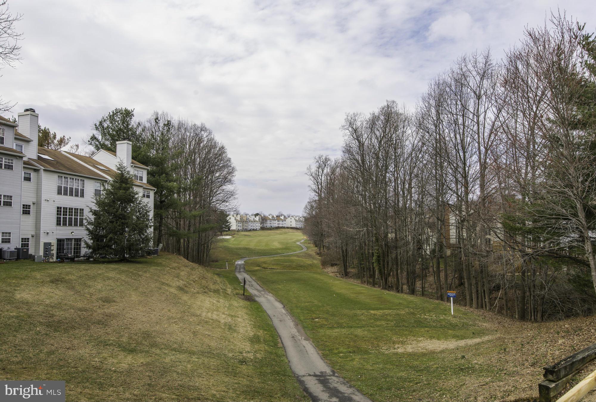 12000 Golf Ridge Court, Unit 352 Fairfax, VA 22033 - Photo 25 of 29 a view of a street with a building in the background