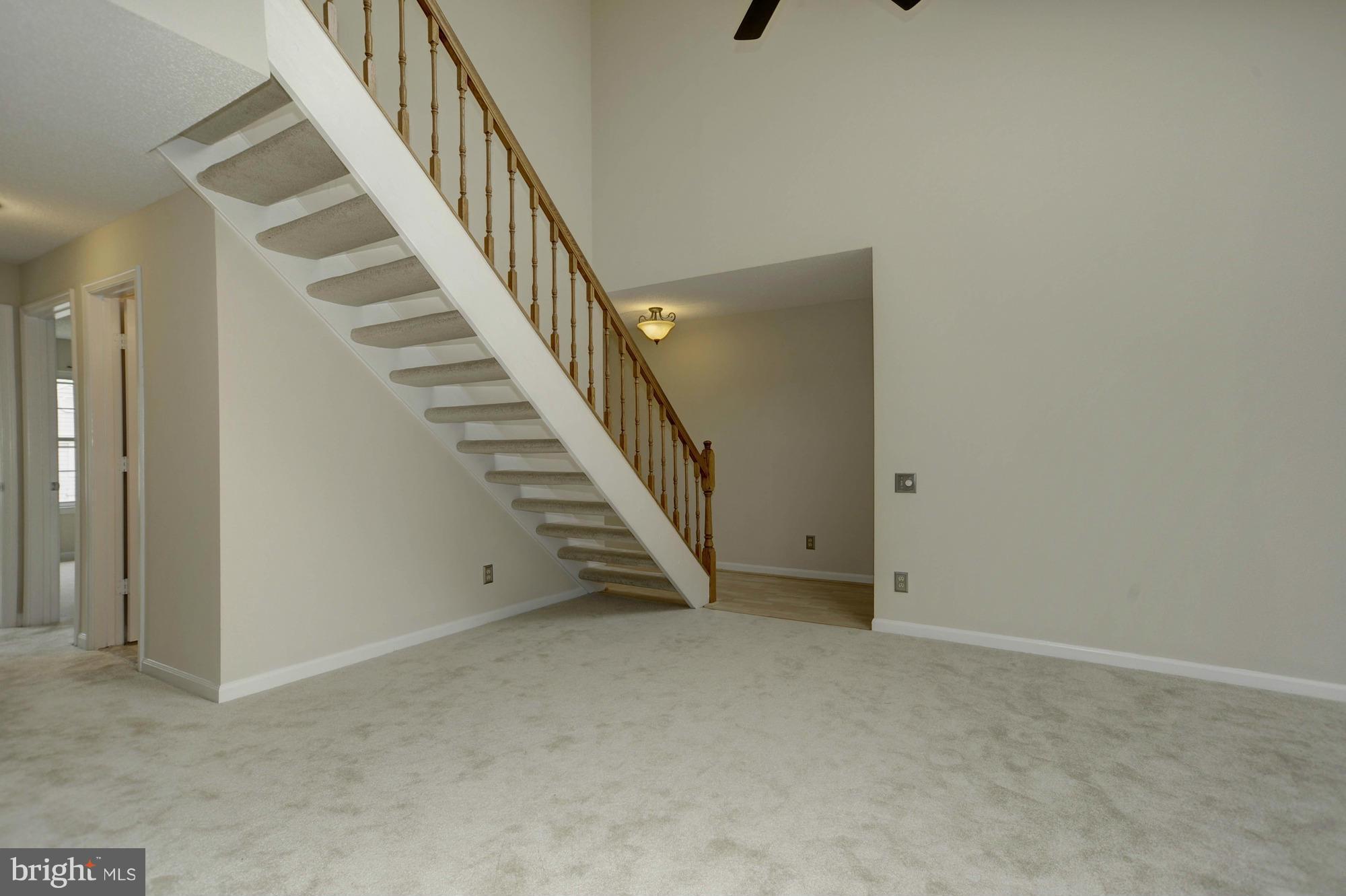 12000 Golf Ridge Court, Unit 352 Fairfax, VA 22033 - Photo 8 of 29 a view of an empty room with stairs