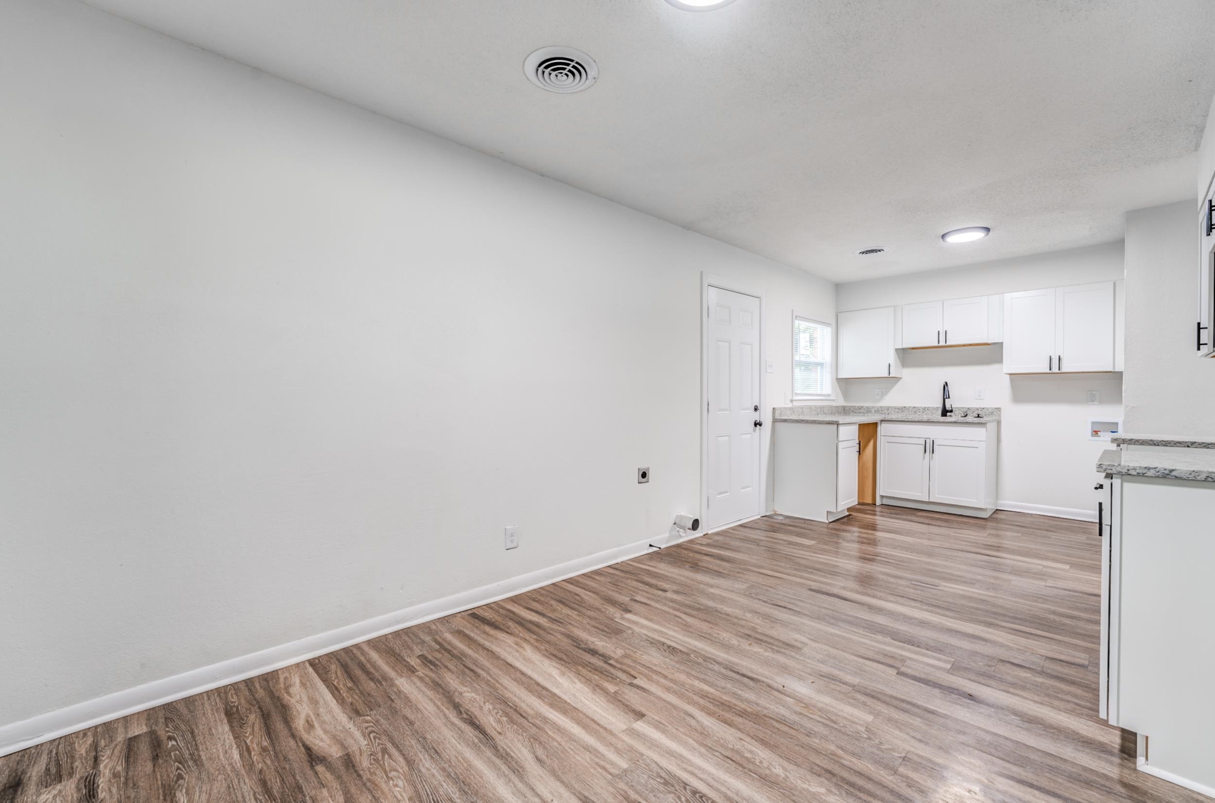 5341 Millbranch Road Memphis, TN 38116 - Photo 17 of 29 a view of kitchen with wooden floor