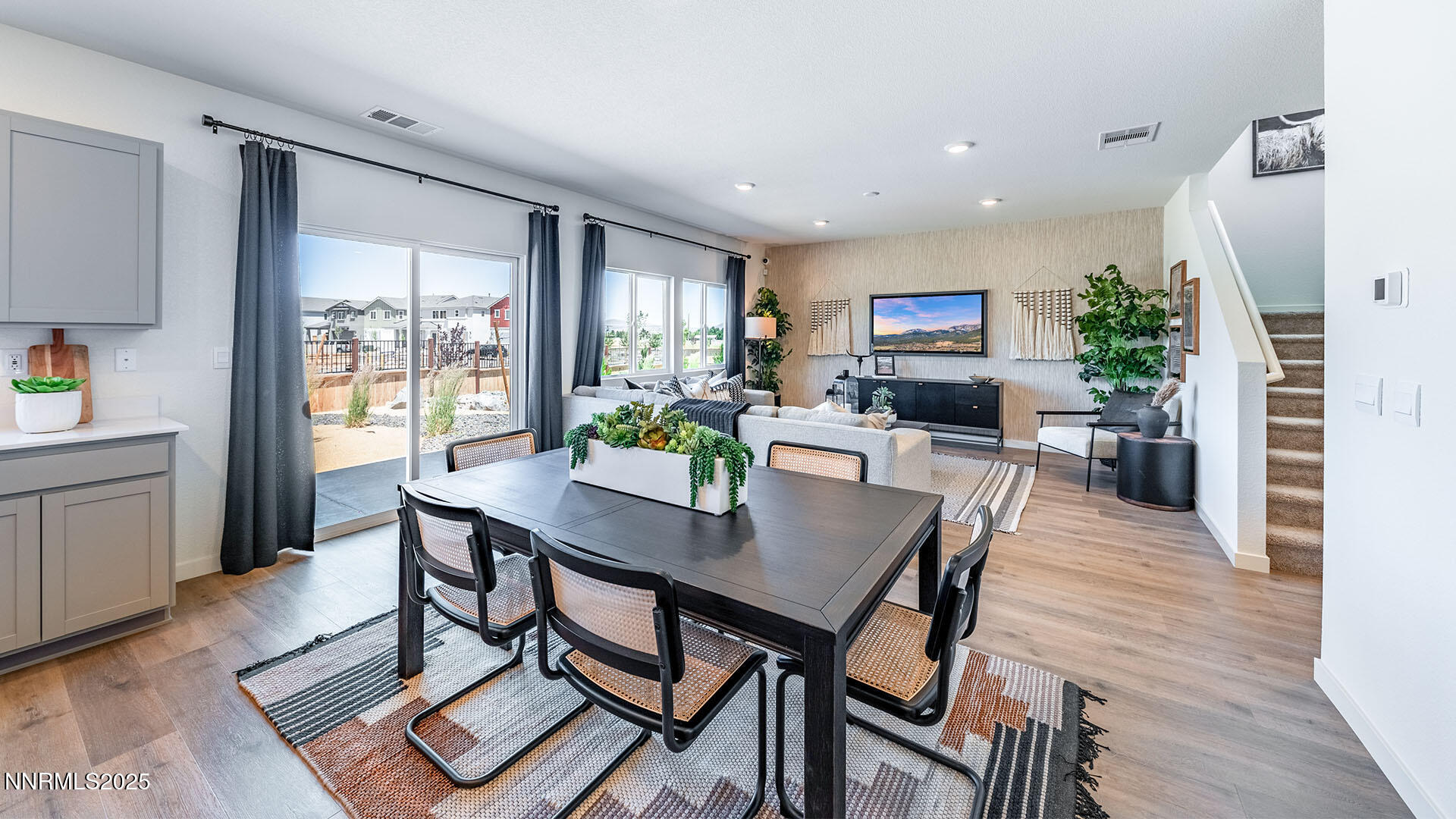 7489 Capstone Drive Reno, NV 89506 - Photo 11 of 25 a view of a dining room with furniture window and wooden floor