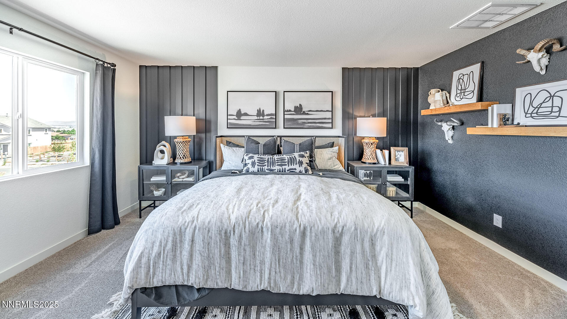 7489 Capstone Drive Reno, NV 89506 - Photo 16 of 25 a bed sitting in a spacious bedroom next to a window