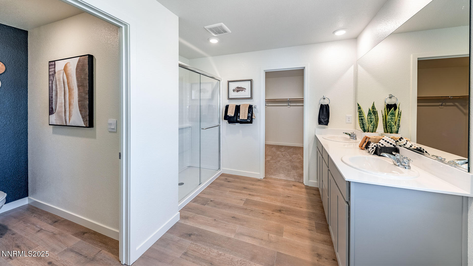 7489 Capstone Drive Reno, NV 89506 - Photo 17 of 25 a bathroom with a sink and mirror