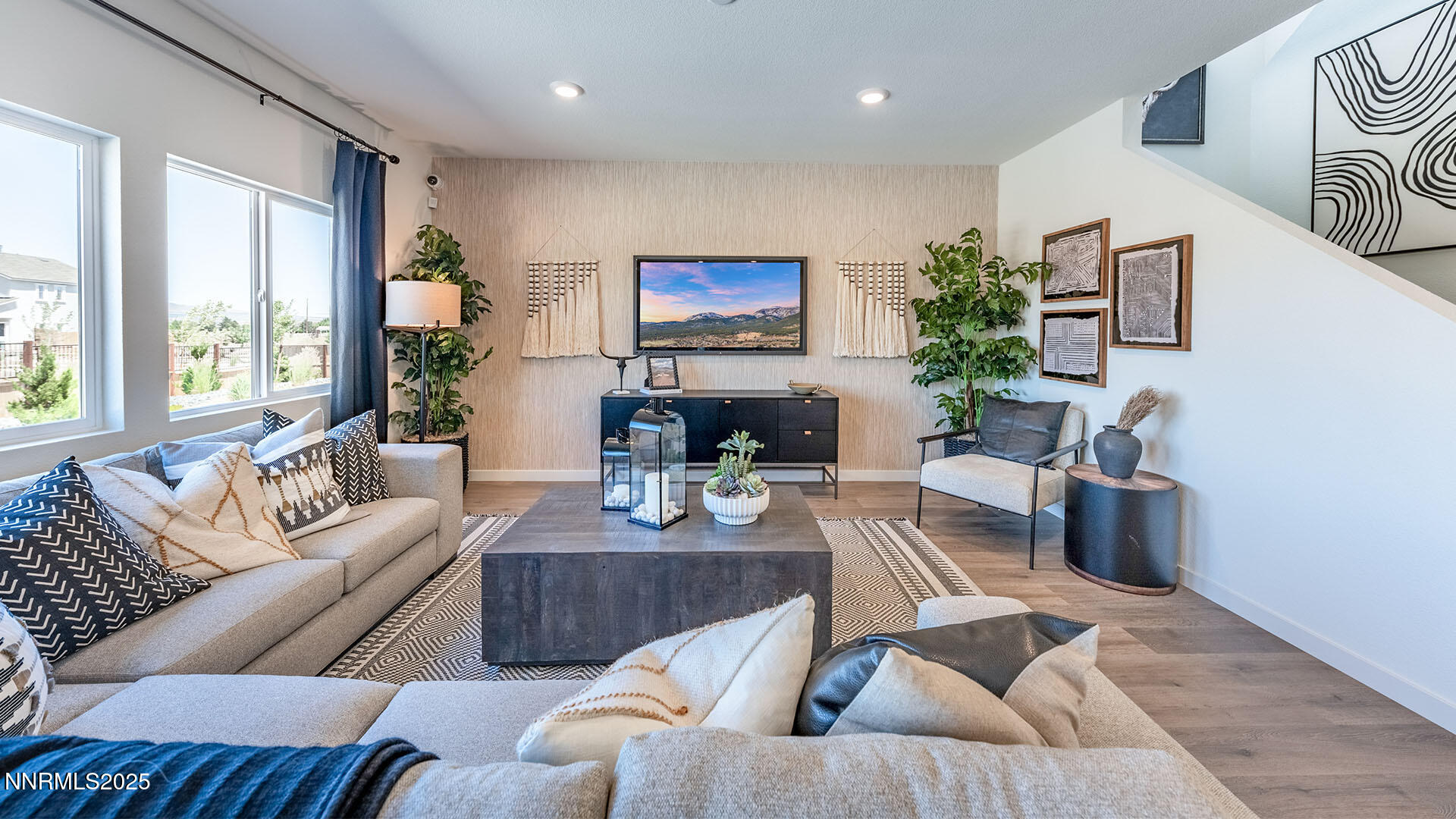 7489 Capstone Drive Reno, NV 89506 - Photo 3 of 25 a living room with furniture and a flat screen tv