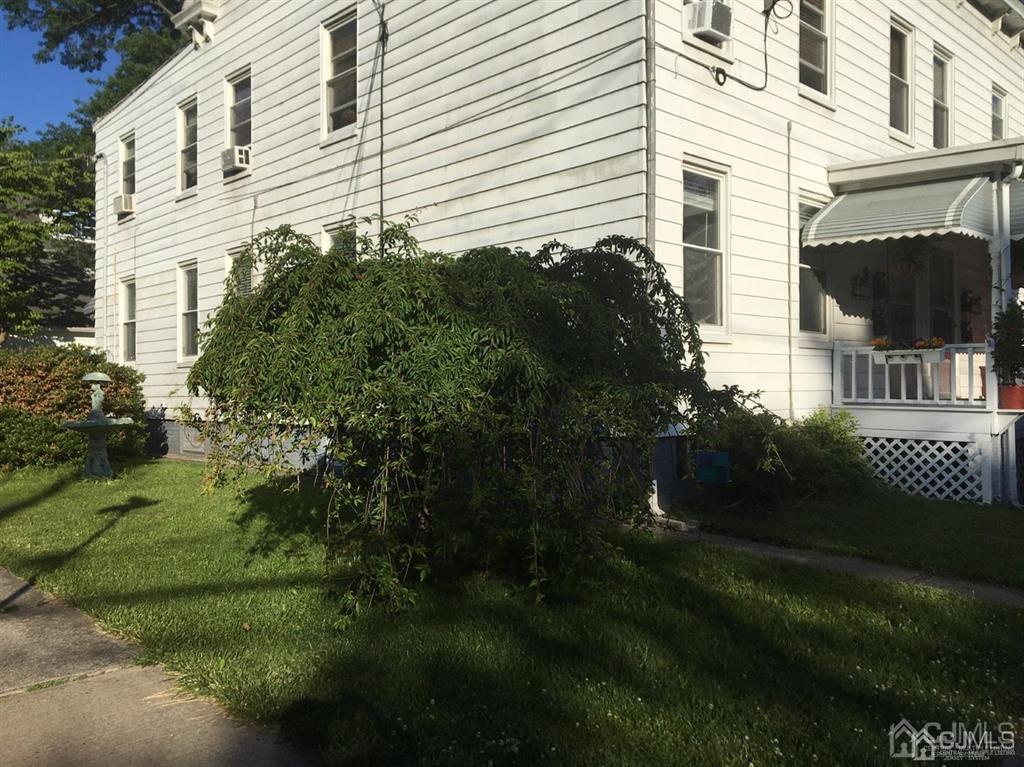 203 Cedar Avenue, Unit A Highland Park, NJ 08904 - Photo 3 of 4 a view of a house with backyard and garden