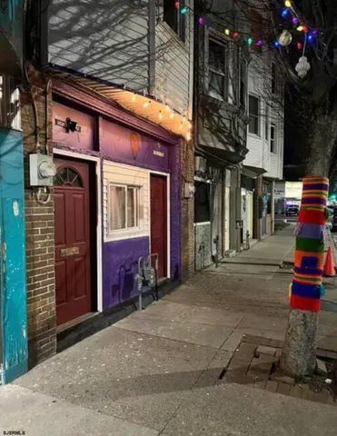 a view of street with parked cars