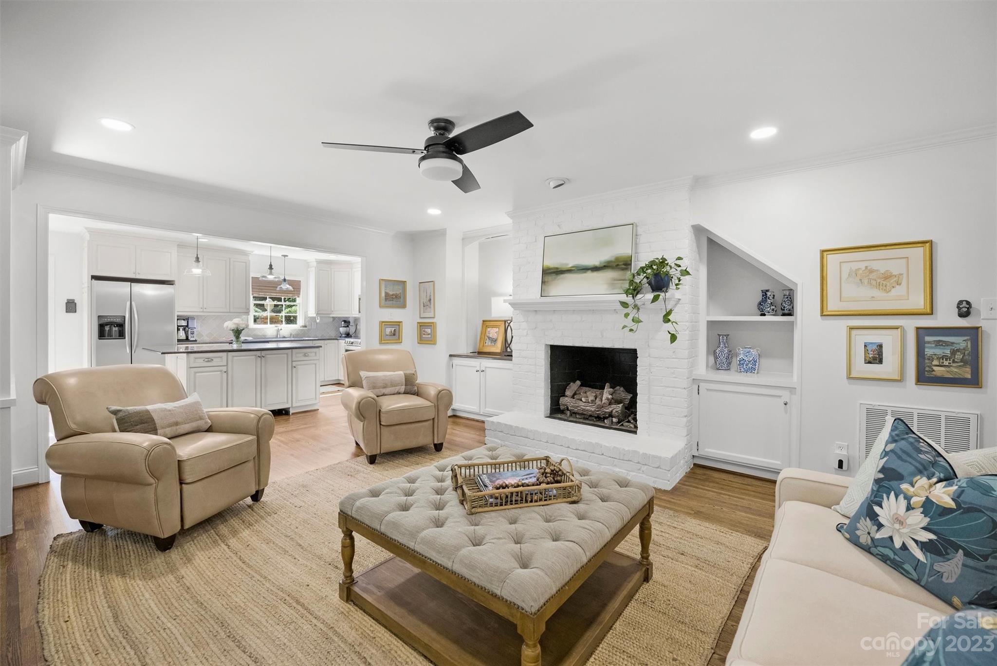 5943 Brace Road Charlotte, NC 28211 - Photo 15 of 36 a living room with furniture and a fireplace