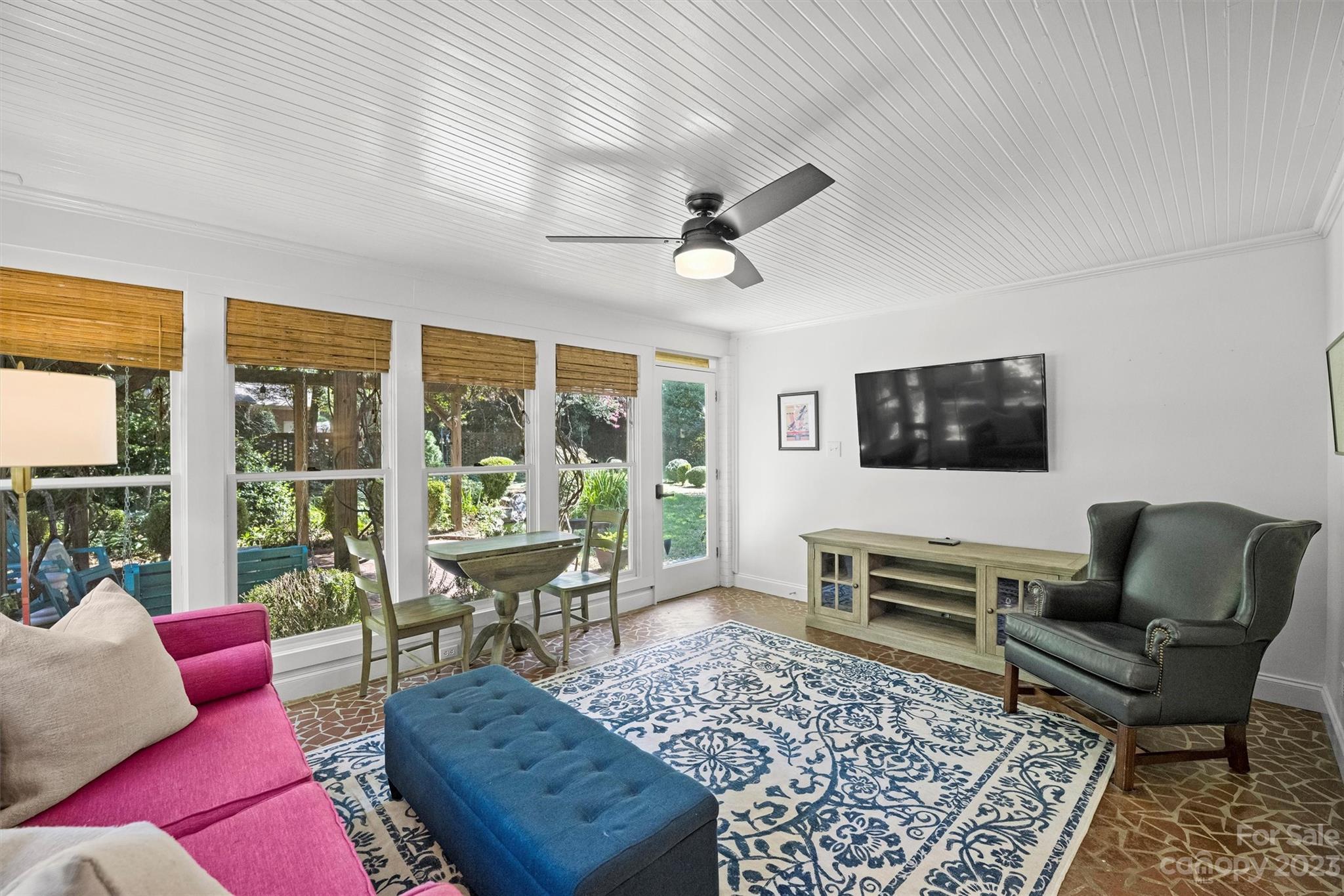 5943 Brace Road Charlotte, NC 28211 - Photo 19 of 36 a living room with furniture and a flat screen tv