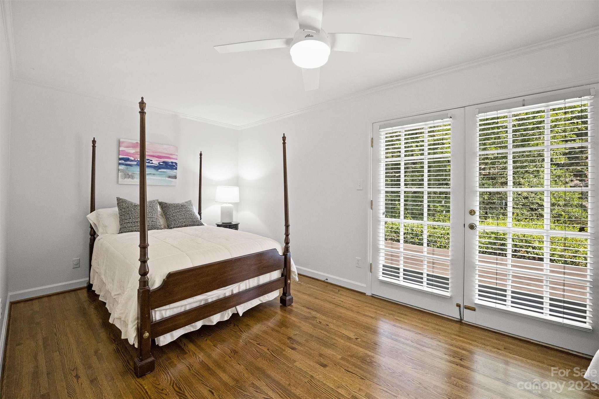 5943 Brace Road Charlotte, NC 28211 - Photo 28 of 36 a bedroom with a bed and a window