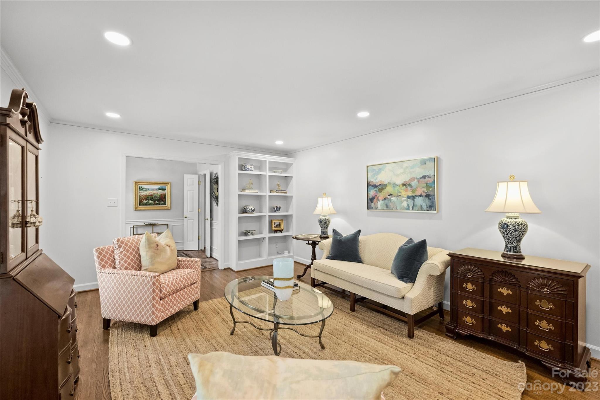5943 Brace Road Charlotte, NC 28211 - Photo 5 of 36 a living room with furniture and wooden floor