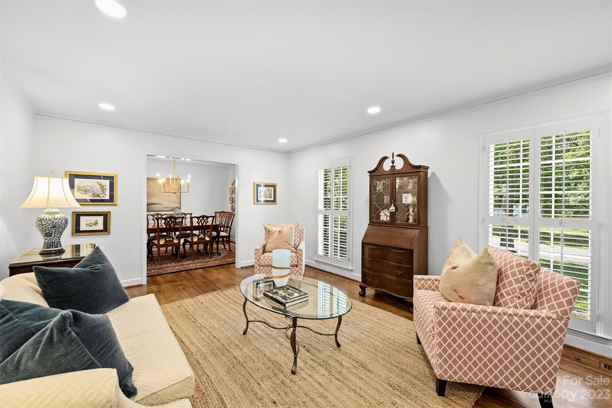 5943 Brace Road Charlotte, NC 28211 - Photo 6 of 36 a living room with furniture and a fireplace