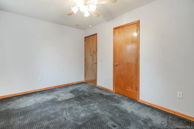an empty room with a bathroom