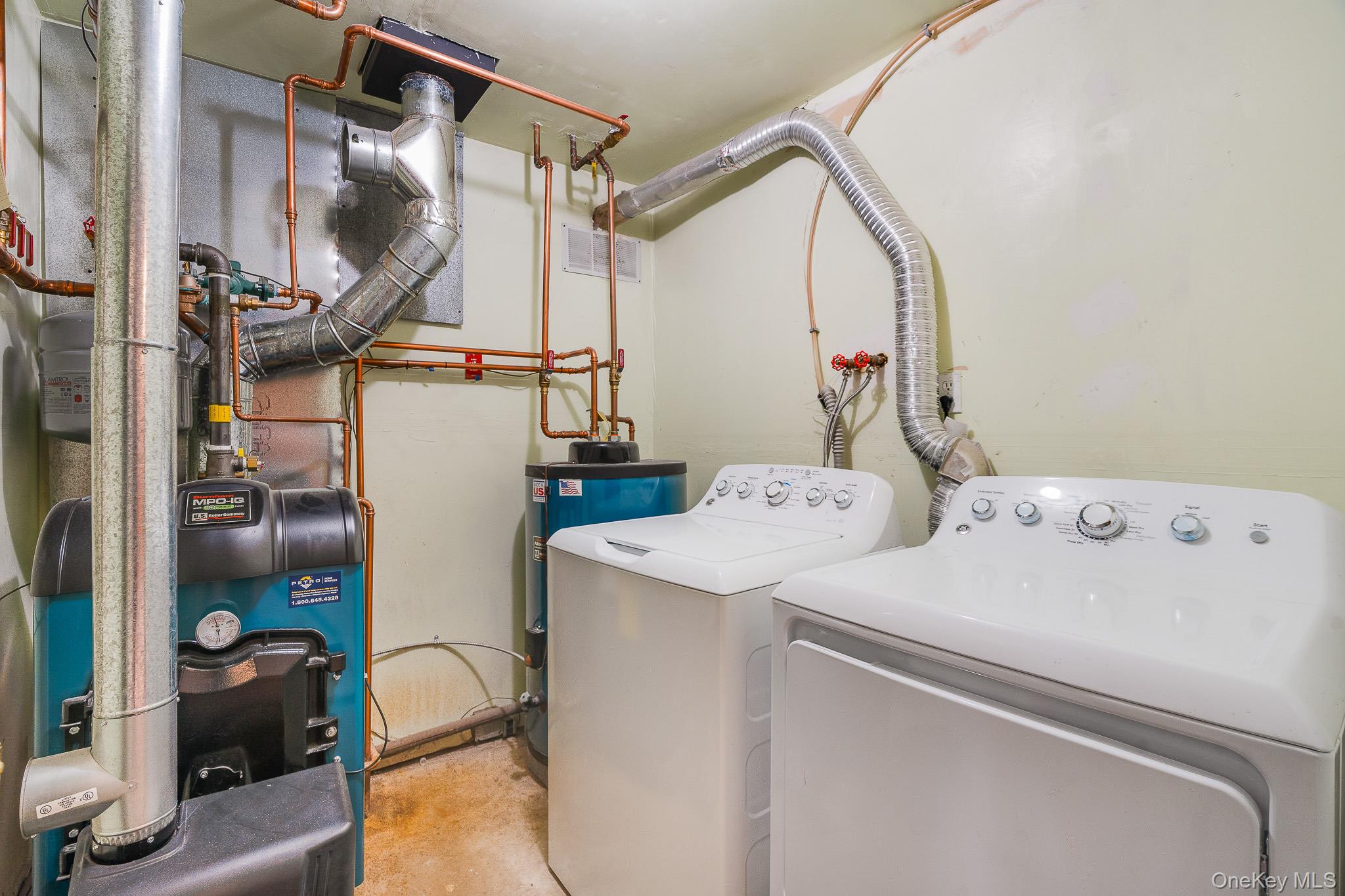 1 Mountain View Road Fishkill, NY 12524 - Photo 22 of 35 a utility room with dryer and washer
