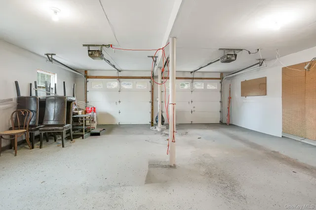 a view of a garage with furniture