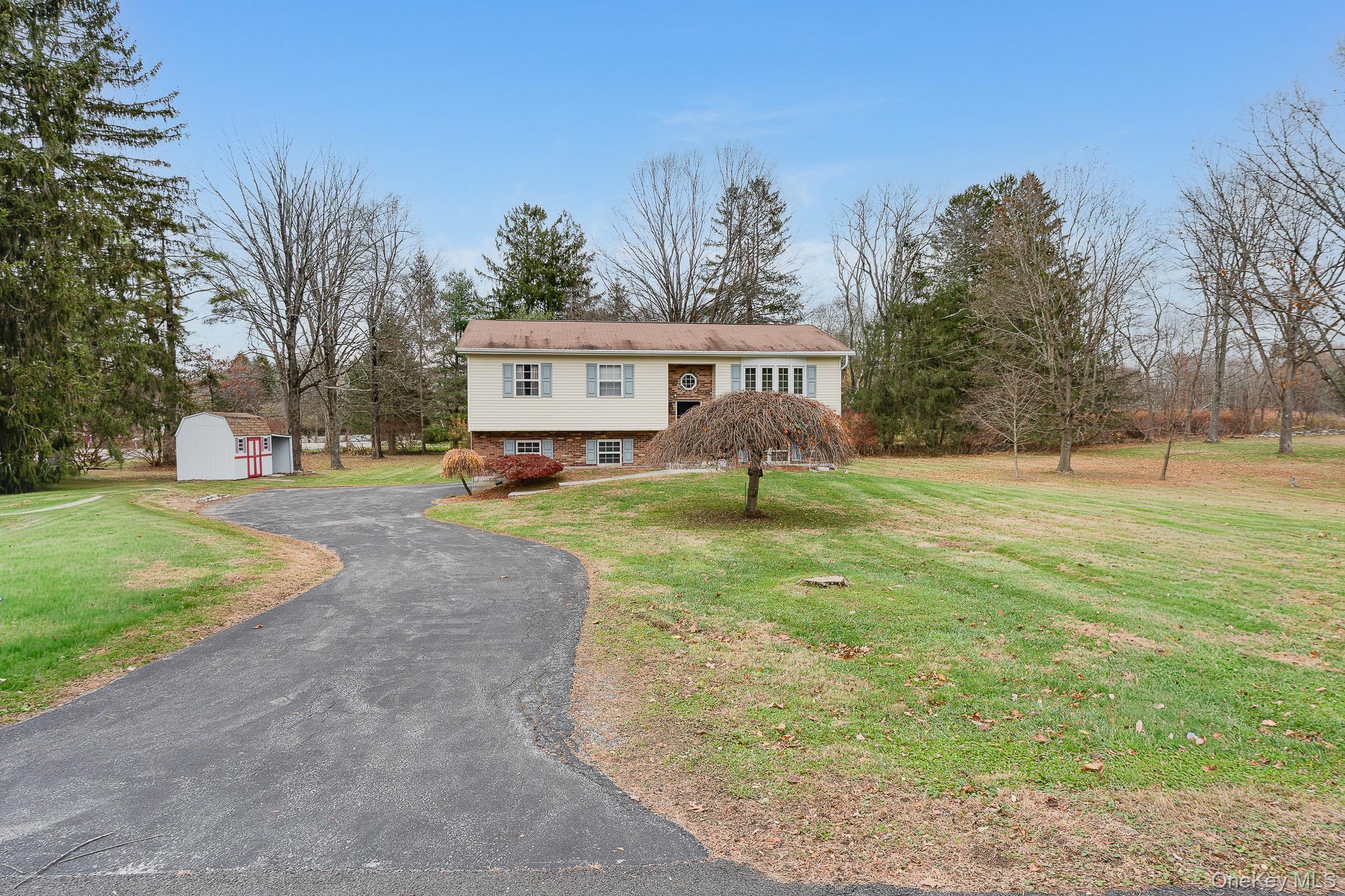 1 Mountain View Road Fishkill, NY 12524 - Photo 28 of 35 a front view of house with yard and trees