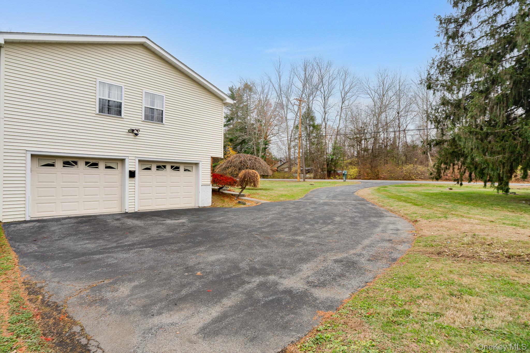 1 Mountain View Road Fishkill, NY 12524 - Photo 30 of 35 a view of a house with backyard and trees