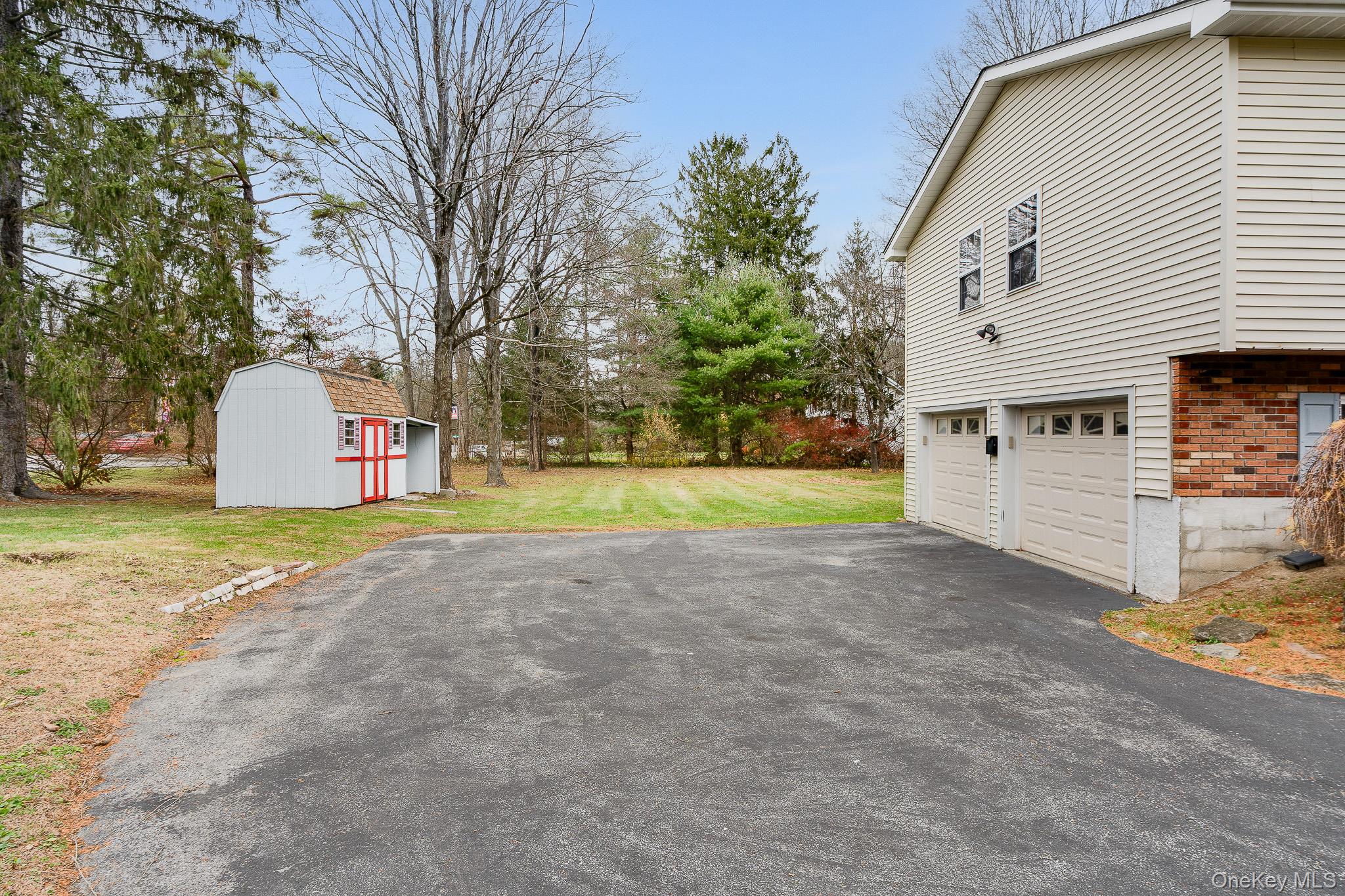 1 Mountain View Road Fishkill, NY 12524 - Photo 31 of 35 a view of a house with a yard and garage