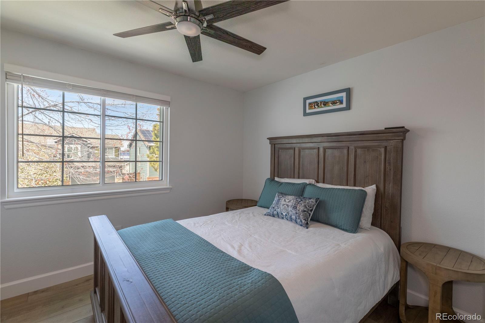 294 West Willowick Circle Highlands Ranch, CO 80129 - Photo 16 of 37 a bedroom with a bed and a window