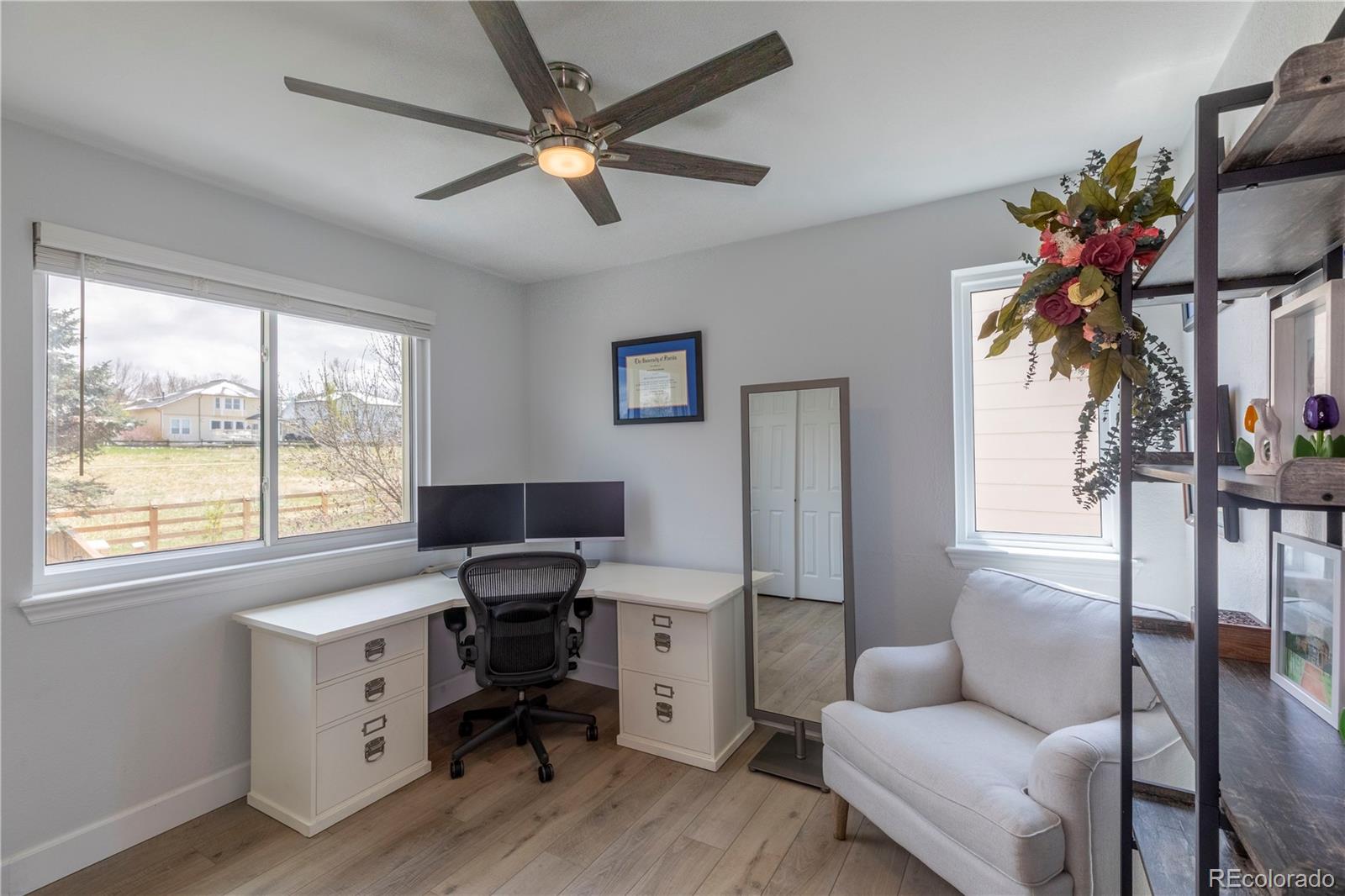 294 West Willowick Circle Highlands Ranch, CO 80129 - Photo 20 of 37 a view of a workspace with furniture and a window