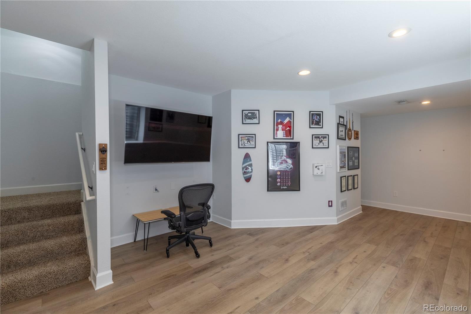 294 West Willowick Circle Highlands Ranch, CO 80129 - Photo 22 of 37 a view of a livingroom with workspace and a couch