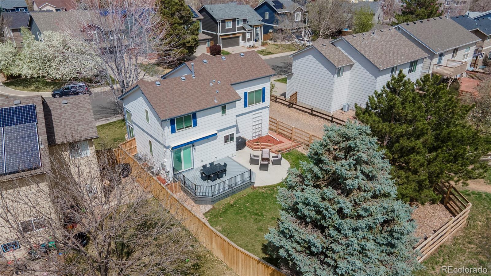 294 West Willowick Circle Highlands Ranch, CO 80129 - Photo 34 of 37 an aerial view of a house with a yard
