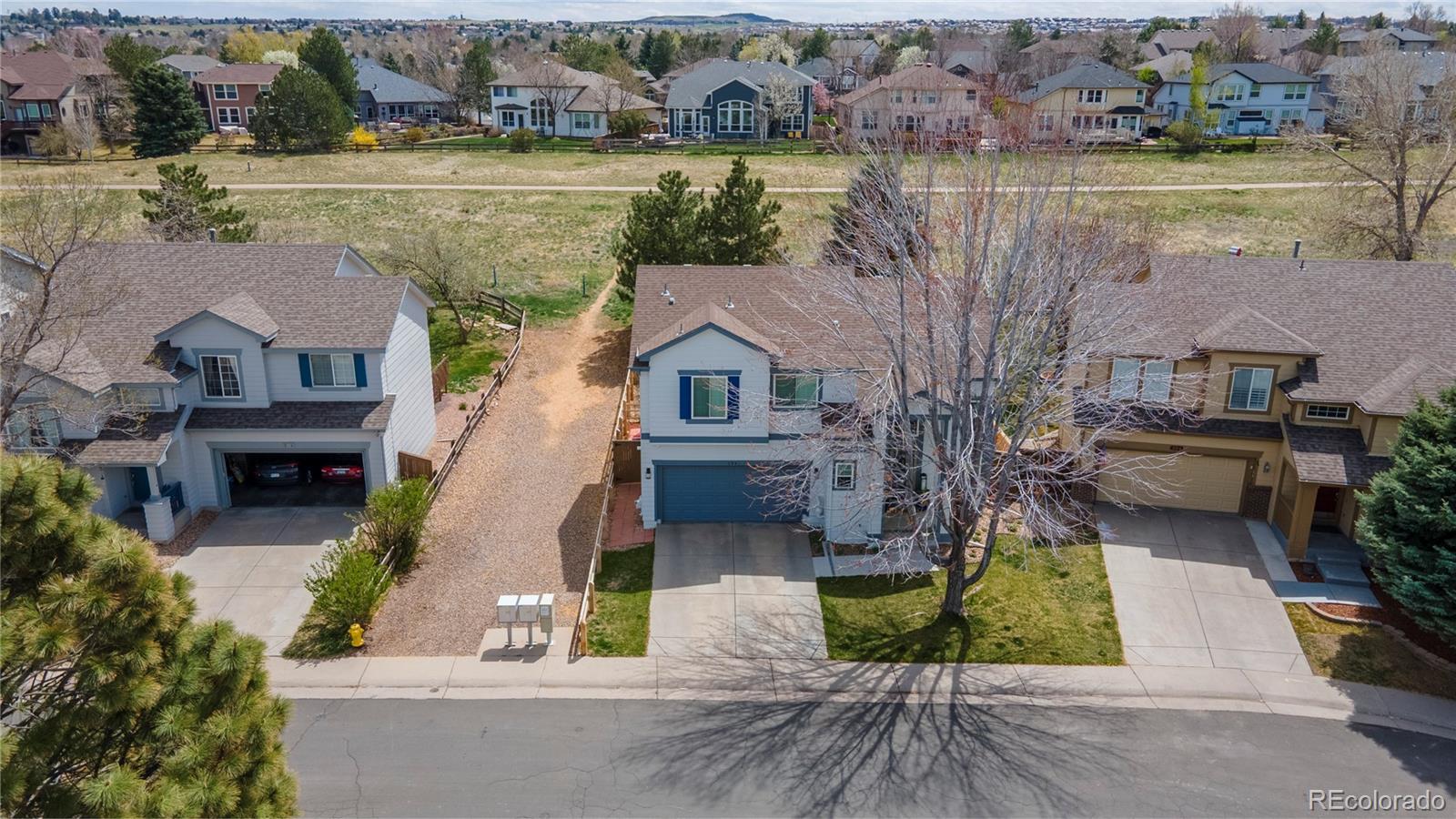 294 West Willowick Circle Highlands Ranch, CO 80129 - Photo 35 of 37 an aerial view of a house with lake view