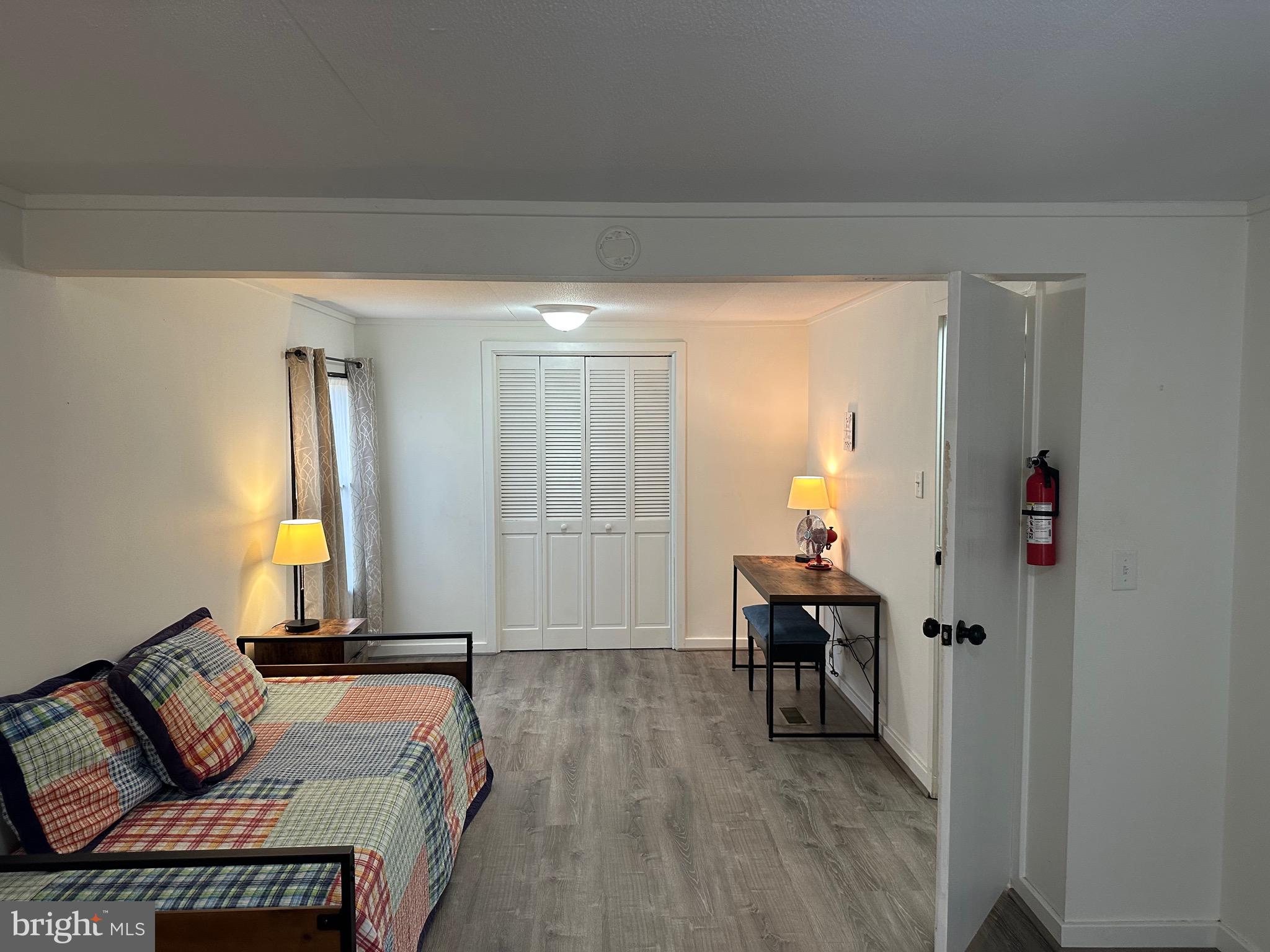 3 Quarry Road Quakertown, PA 18951 - Photo 8 of 16 a bedroom with a bed and a chandelier