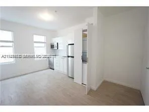 a view of a kitchen with a closet