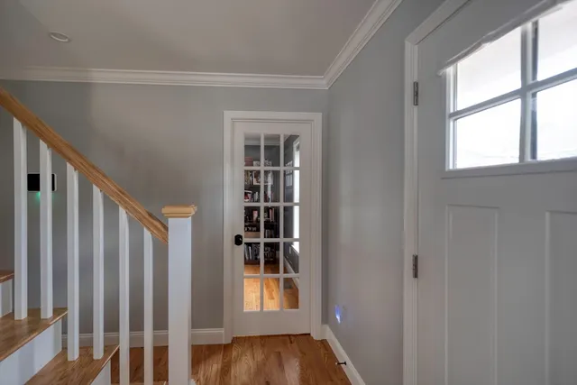a view of front door with stairs