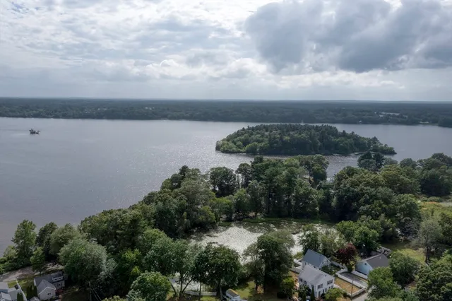 an aerial view of residential house with outdoor space