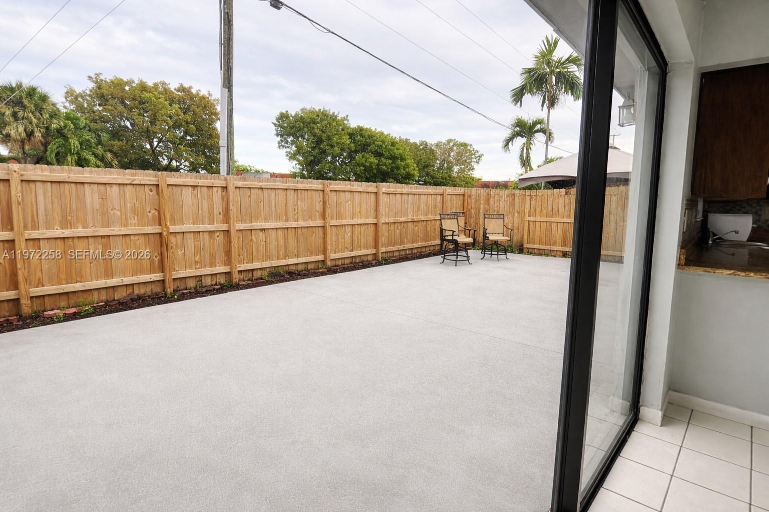 10900 Northwest 7th Street, Unit 101 Miami, FL 33172 - Photo 9 of 10 a view of a terrace