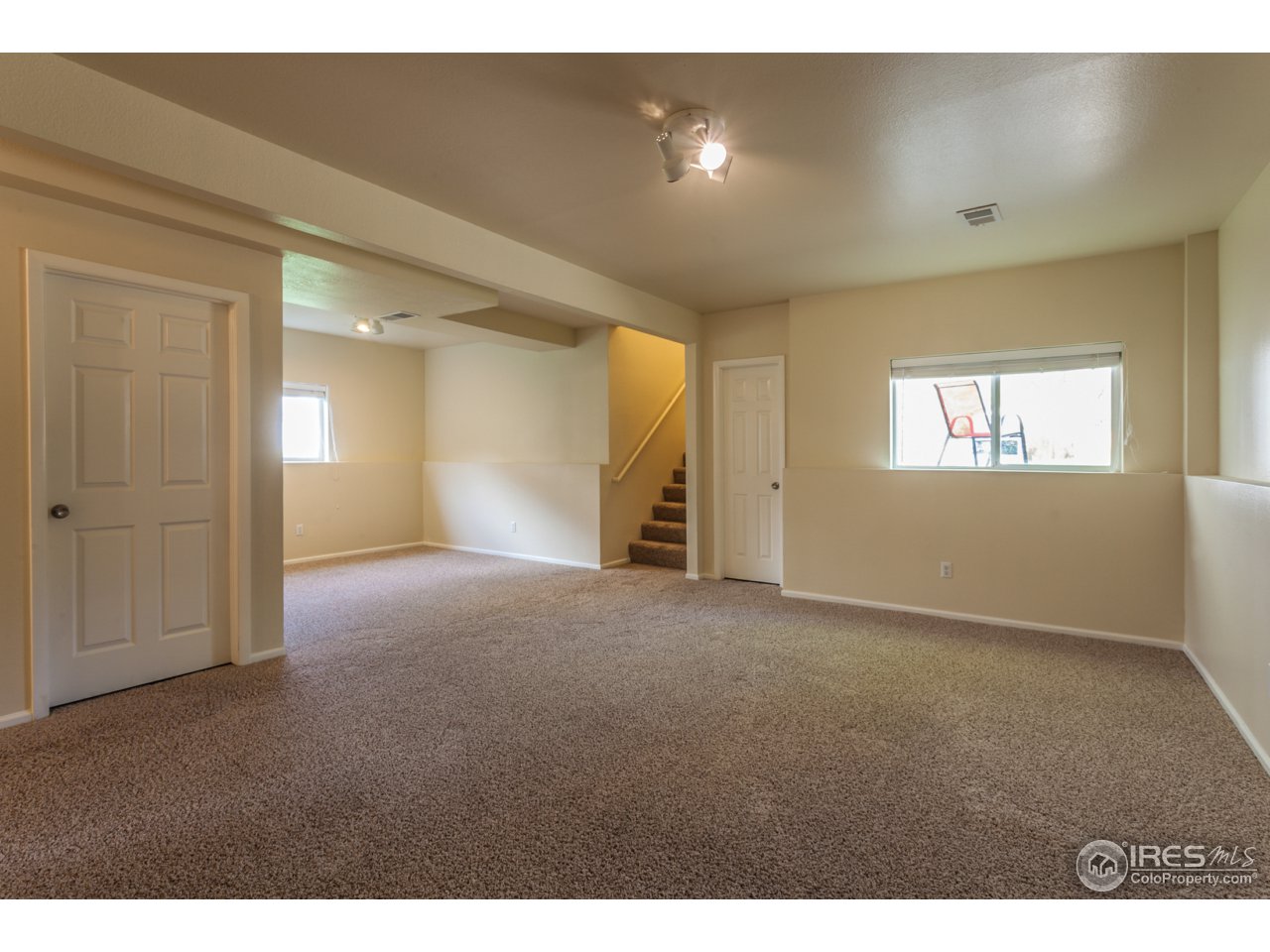 849 Aztec Drive Fort Collins, CO 80521 - Photo 23 of 34 Huge family room/rec room on lower level
