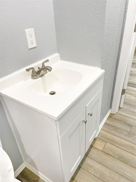 141 South Hiawassee Road Orlando, FL 32835 - Photo 15 of 30 a bathroom with a sink and a mirror