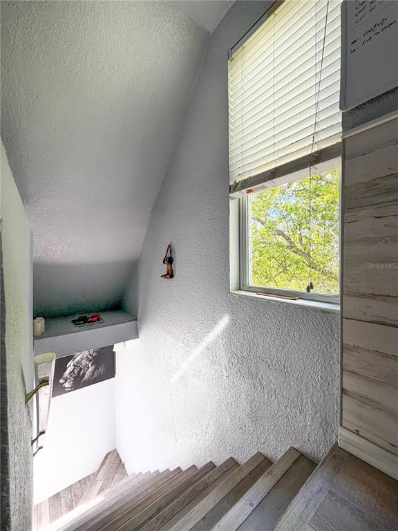 141 South Hiawassee Road Orlando, FL 32835 - Photo 23 of 30 a view of a living room with a window