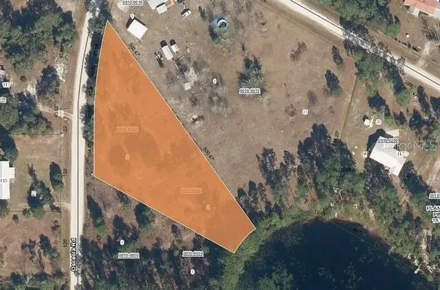 a view of swimming pool with a yard