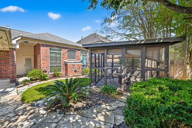 a house view with a garden space