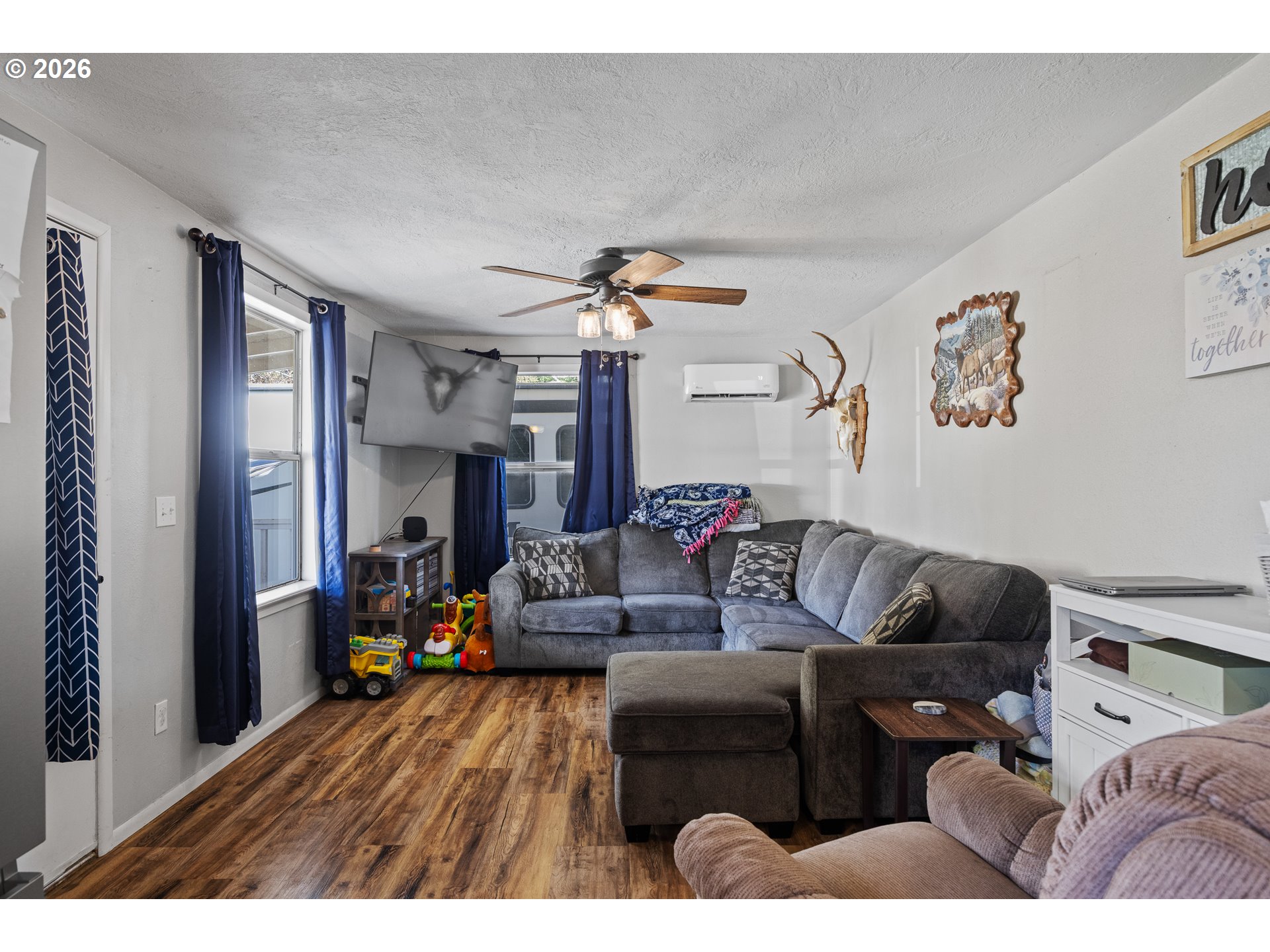 1932 East Willow Street Myrtle Point, OR 97458 - Photo 5 of 28 a living room with furniture and a wooden floor