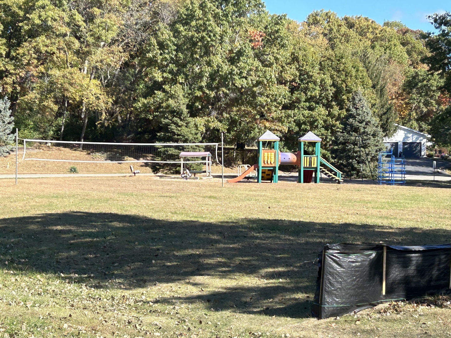 919 Missouri Drive Dixon, IL 61021 - Photo 12 of 18 a view of swimming pool with outdoor seating and trees in the background