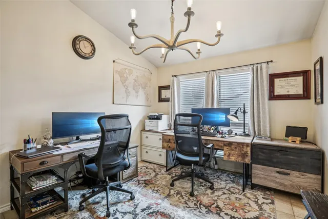 a kitchen with stainless steel appliances a sink a stove a microwave and cabinets