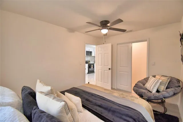 a bedroom with a bed and furniture