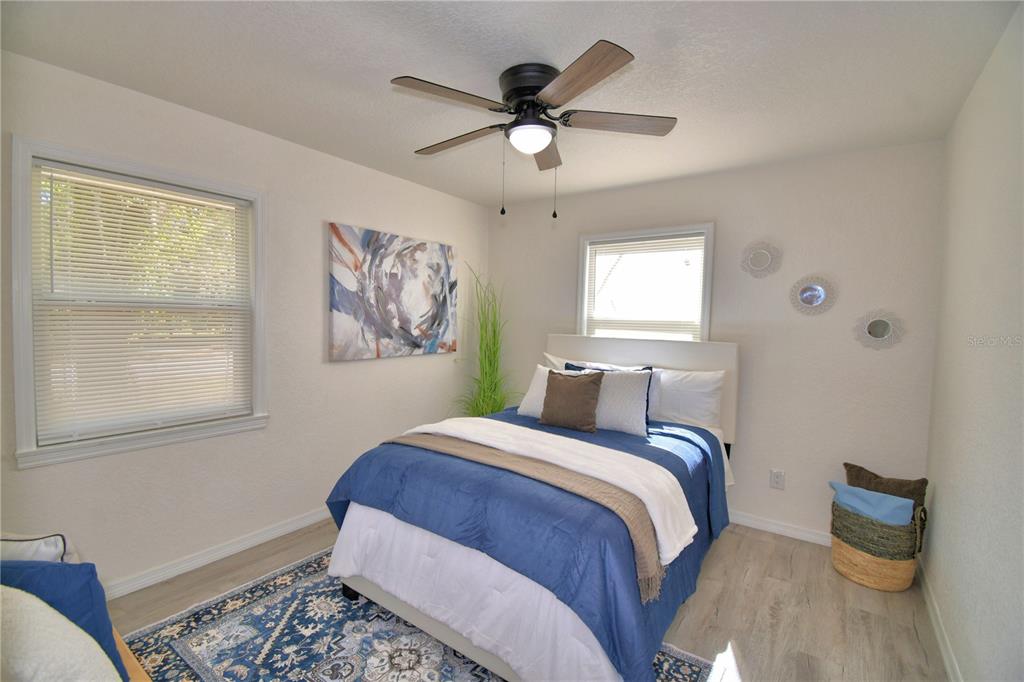 6960 2nd Street Mulberry, FL 33860 - Photo 26 of 39 a bedroom with a bed and a window