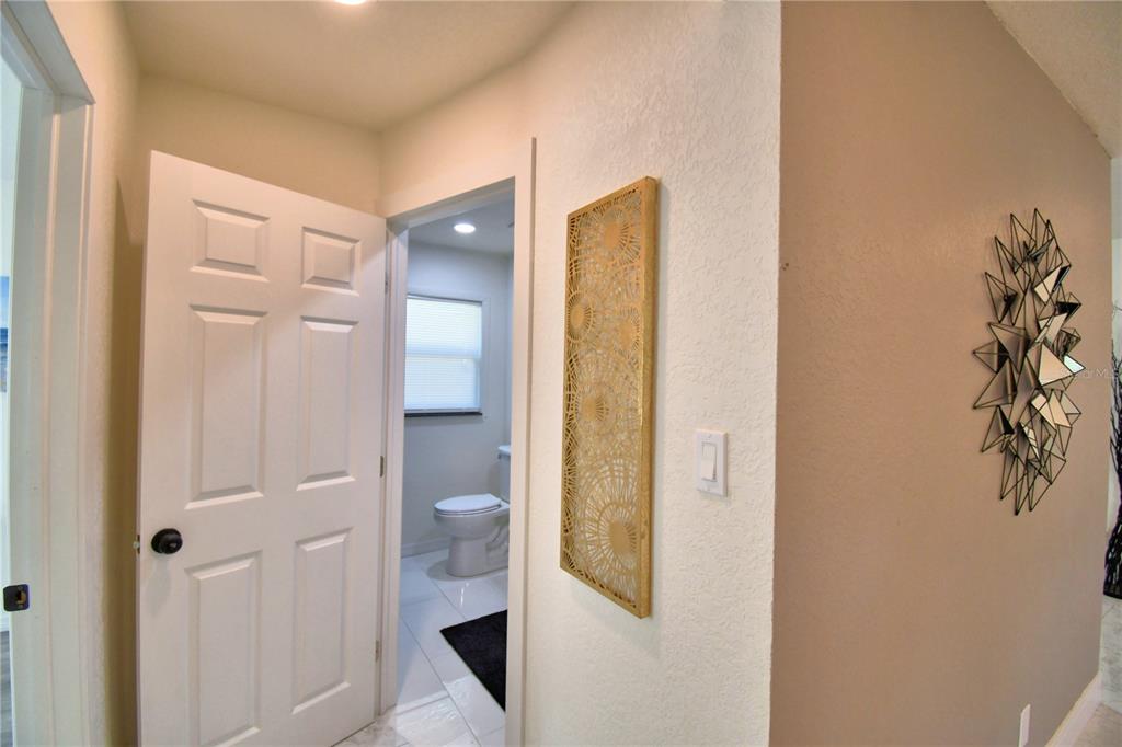 6960 2nd Street Mulberry, FL 33860 - Photo 33 of 39 a bathroom with a sink and a mirror