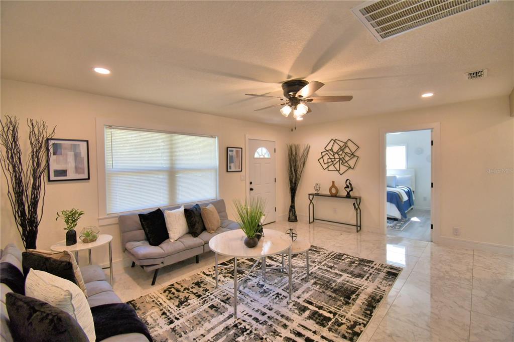 6960 2nd Street Mulberry, FL 33860 - Photo 9 of 39 a living room with furniture