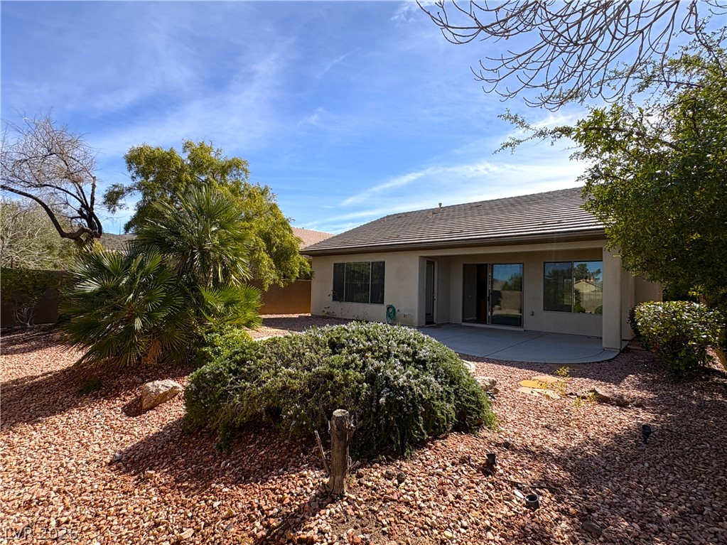 10 Caprington Road Henderson, NV 89052 - Photo 18 of 44 A tranquil desert landscape encircles this home, offering a private outdoor escape with ample space for relaxation.