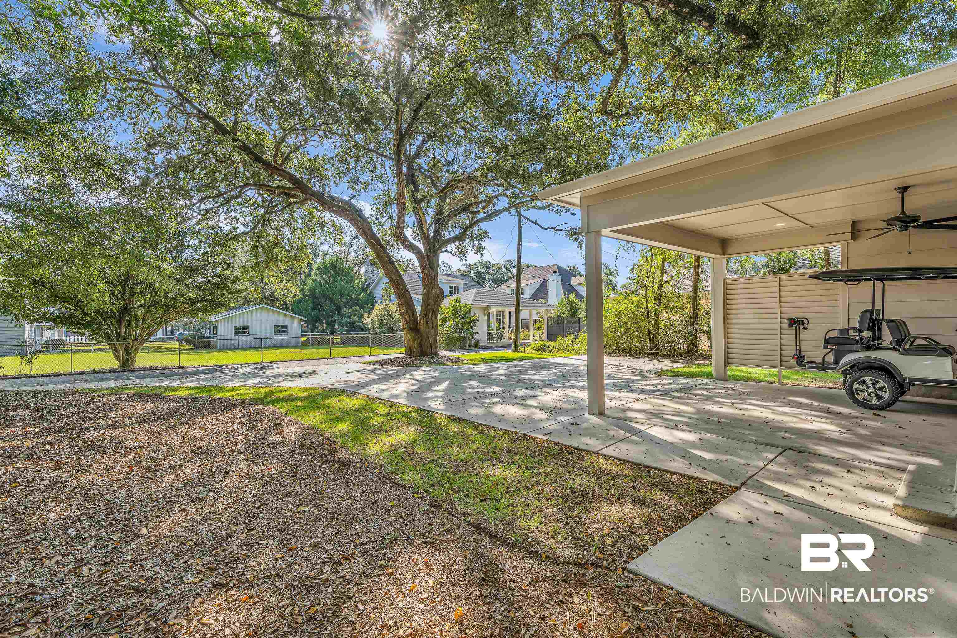 357 Azalea Street Fairhope, AL 36532 - Photo 2 of 22 View of yard featuring ceiling fan