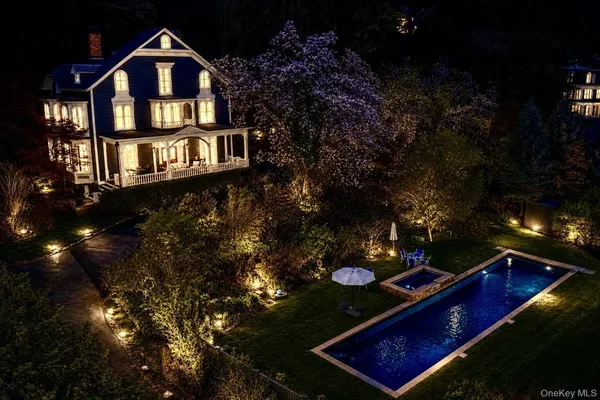 a view of a house with a yard