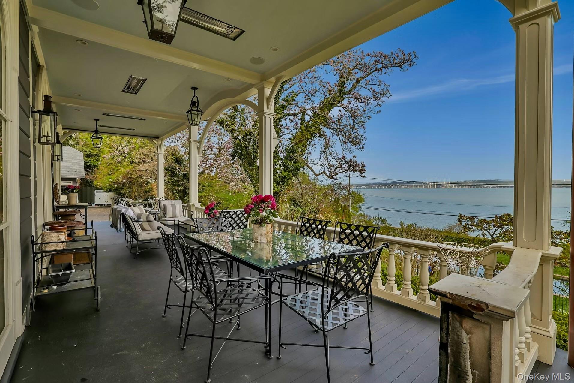 216-217 River Road Nyack, NY 10960 - Photo 13 of 50 a view of a chairs and table in the patio
