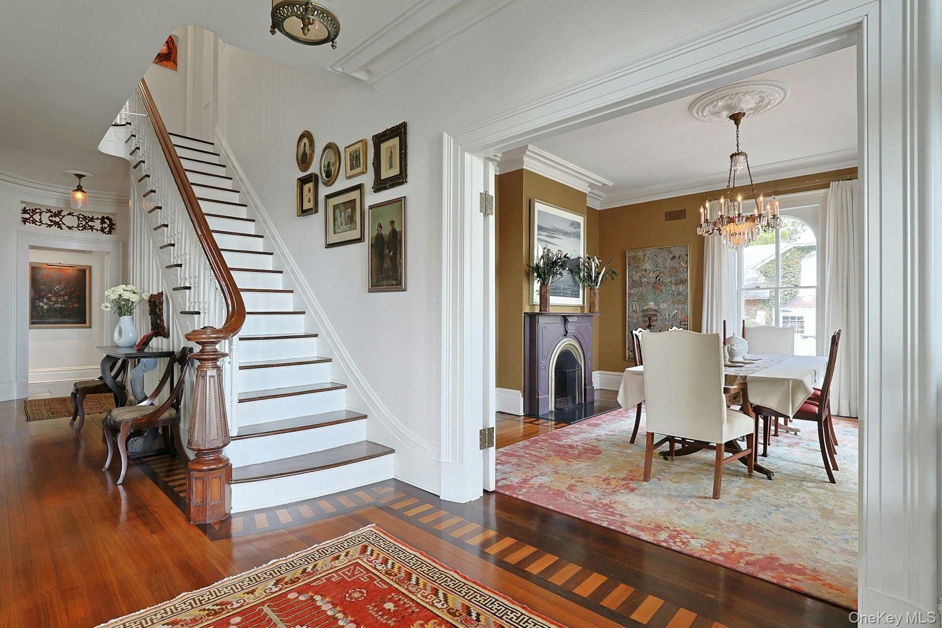 216-217 River Road Nyack, NY 10960 - Photo 18 of 50 a view of a livingroom with furniture staircase and a dining room